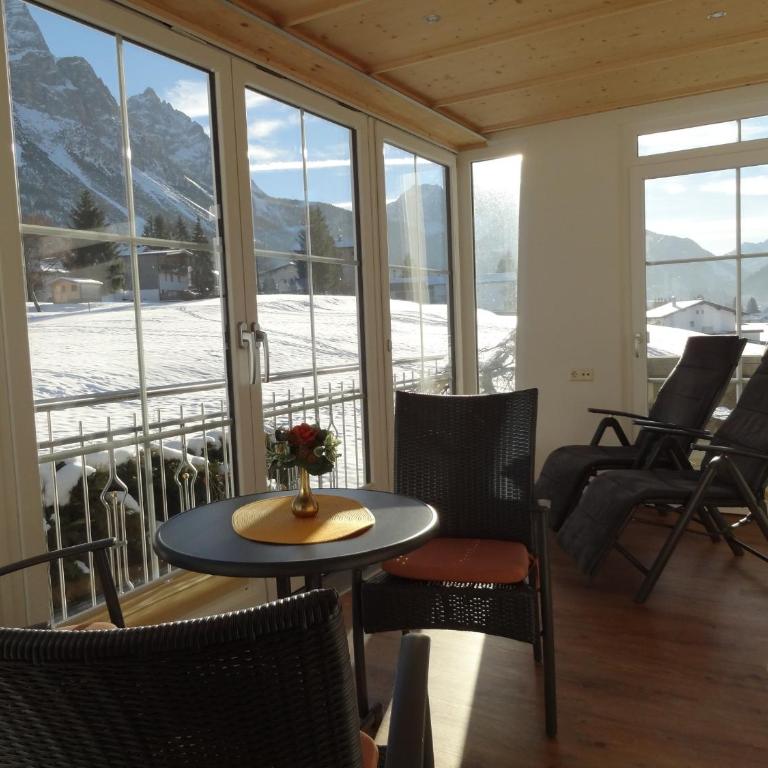Appartements Loisachpromenade - Apartment mit 1 Schlafzimmer und Wintergarten - 8