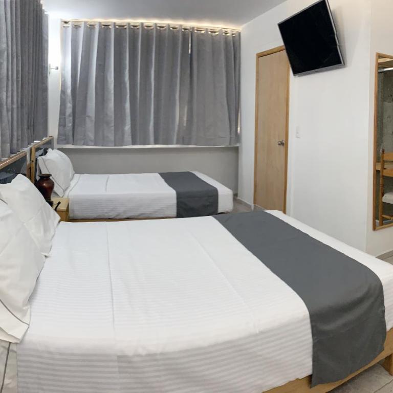 Hotel Real GDL - Habitación Cuádruple Estándar - 6