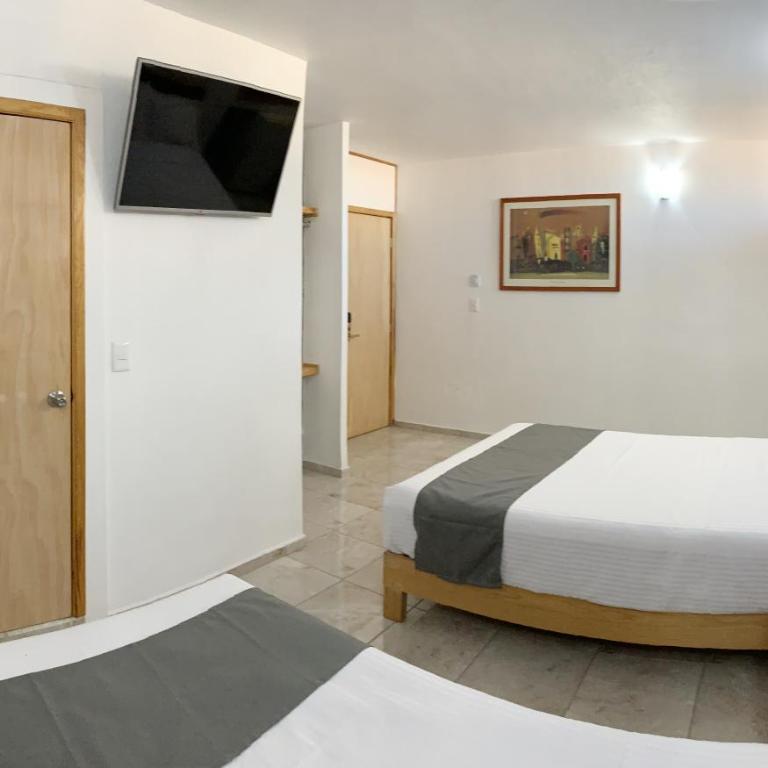 Hotel Real GDL - Habitación Cuádruple Estándar - 7
