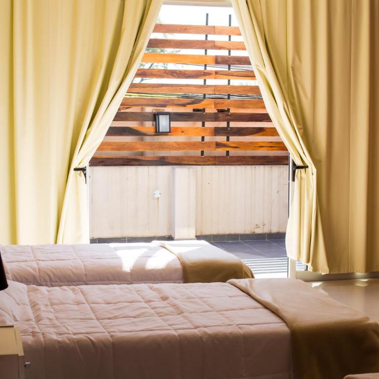 Santinos Suites - Triple Room with Balcony - 1