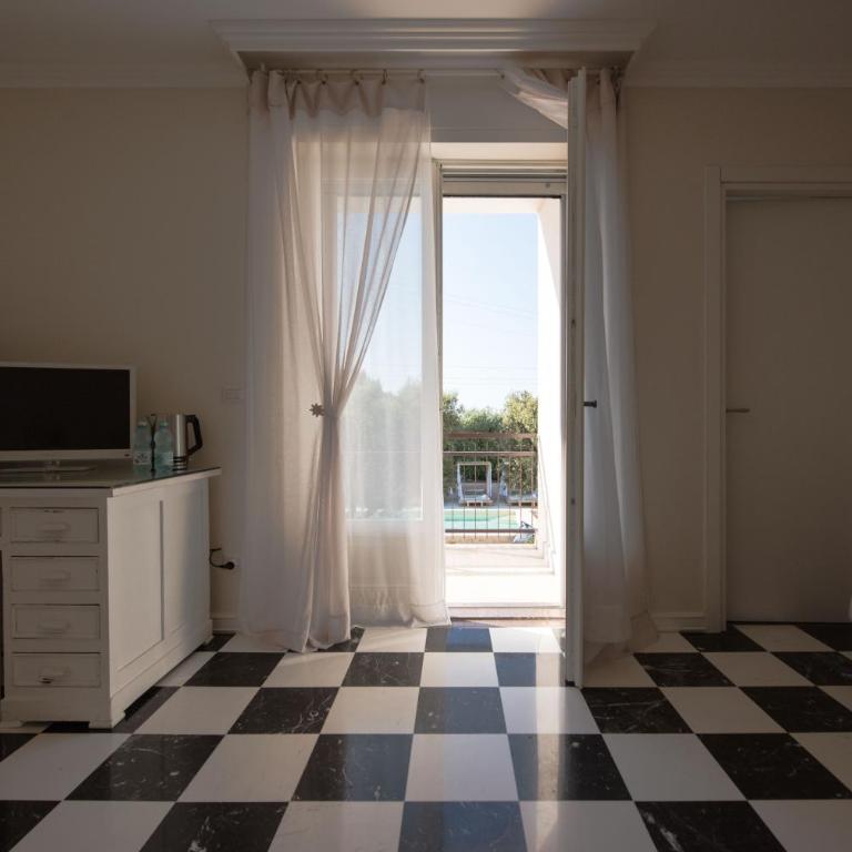 Residenza Il Sole - Camera Matrimoniale Deluxe con Vista Piscina - 11