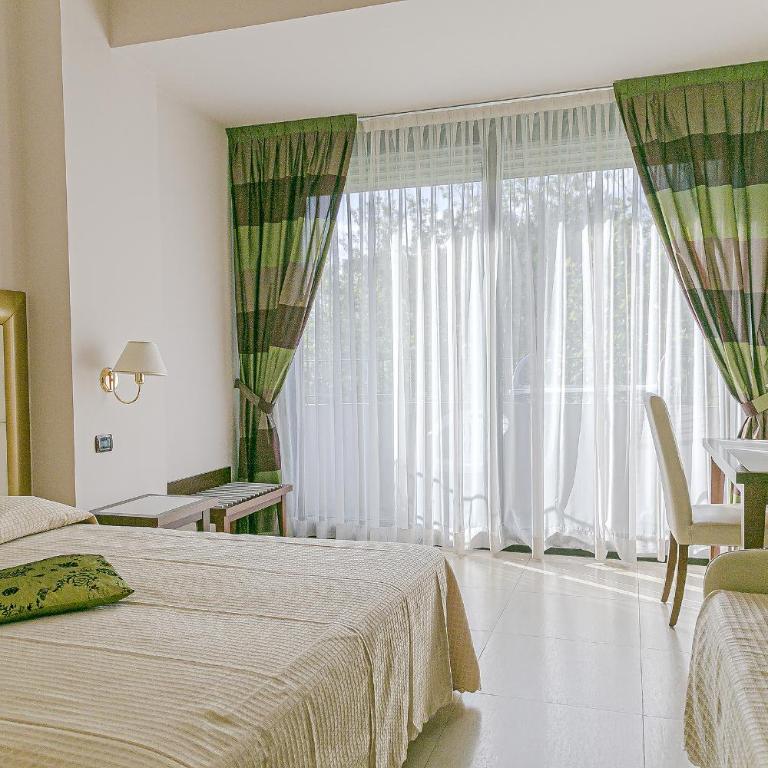 Hotel Metropolitan - Bianchi Hotels - Camera Tripla Deluxe - 1