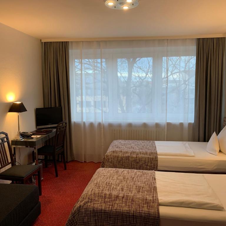 Hotel Nymphenburg City - München - Doppelzimmer - 13