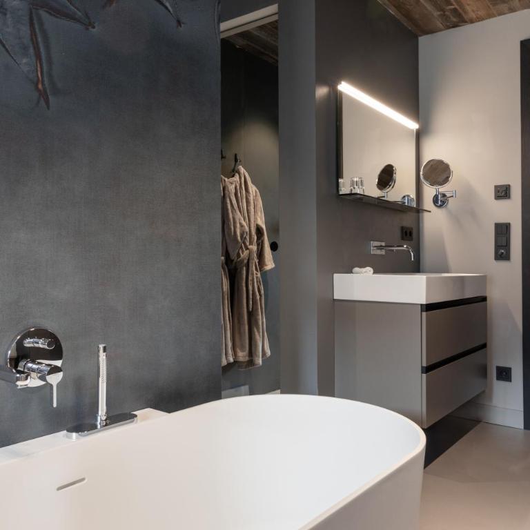 GOING TRIPLE A apartments WEST - Penthouse-Apartment mit Whirlpool - 13