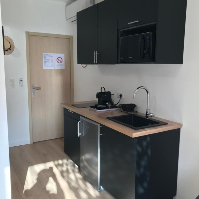 Villa le sud appartements - Appartement - Vue sur Jardin - 11