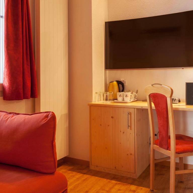 Hotel Capricorn - Familiensuite mit Blick auf das Dorf - 7