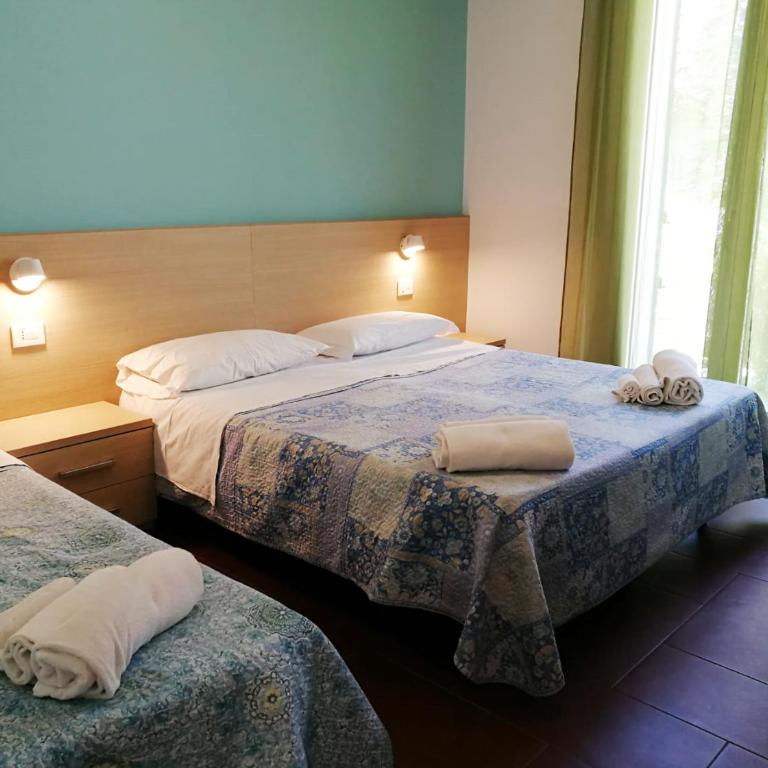 Margherita Rimini - Appartamenti al Mare - Appartamento con 2 Camere da Letto e Giardino - 1