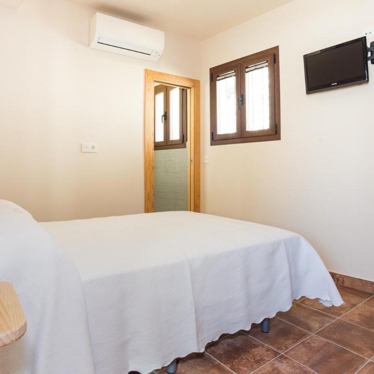 Montevive, disfruta los atardeceres únicos de Granada en nuestra terraza - Four-Bedroom House - 11