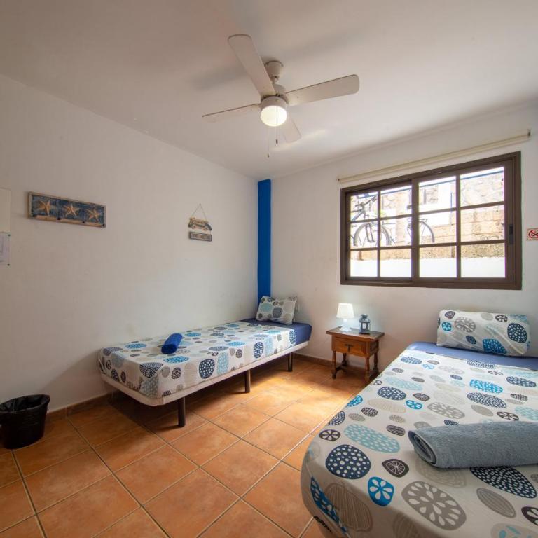La Tortuga Hostel - Habitación Doble con baño compartido - 2 camas - 1