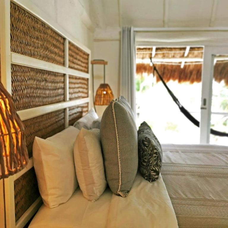 Coco Unlimited - Habitación Triple Superior con vistas parciales al mar - 2