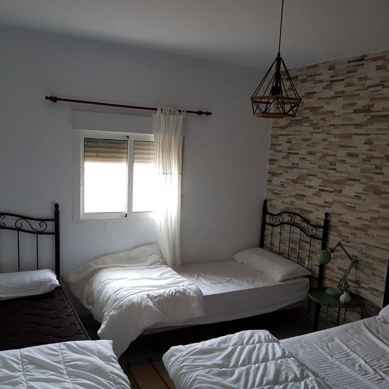 Casa Víctor 50 metros de la playa - Three-Bedroom Townhouse - 11