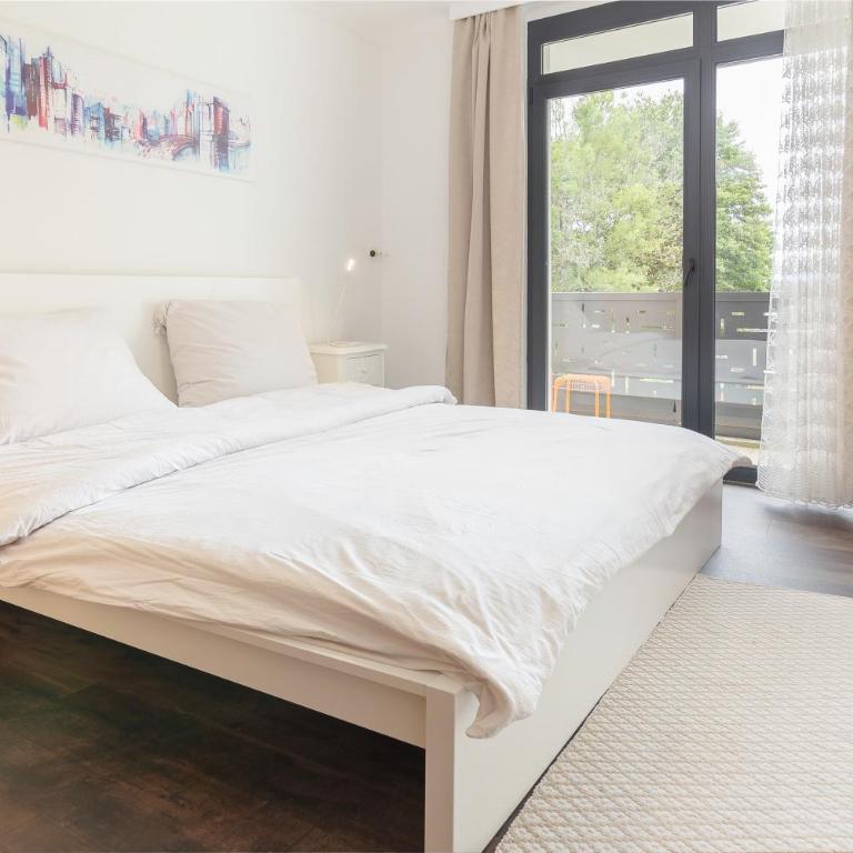 das West - Apartment mit Seeblick - 12