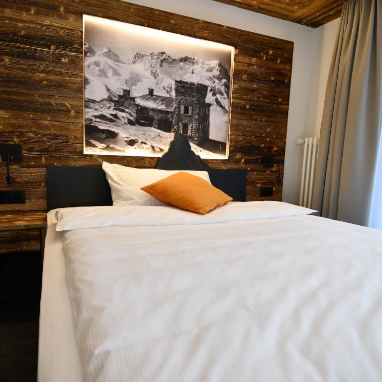 Hotel Elite - Superior Zimmer mit Queensize-Bett und Blick auf das Matterhorn - 4