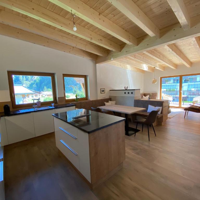 Gästehaus Waltraud - Apartment mit Blick auf die Berge - 7