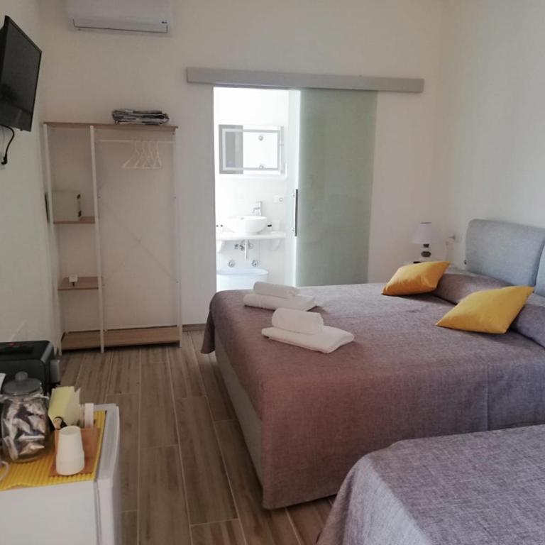 Flamingo Guest House- Rooms - Camera Familiare con Bagno Privato - 7