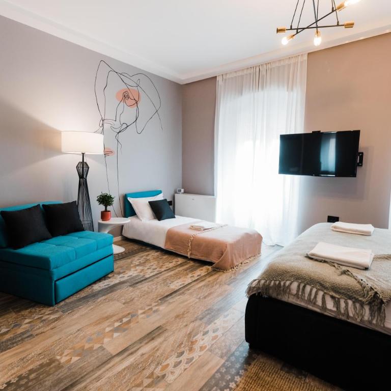 Square 19-Boutique rooms - Deluks Porodična Soba - 1