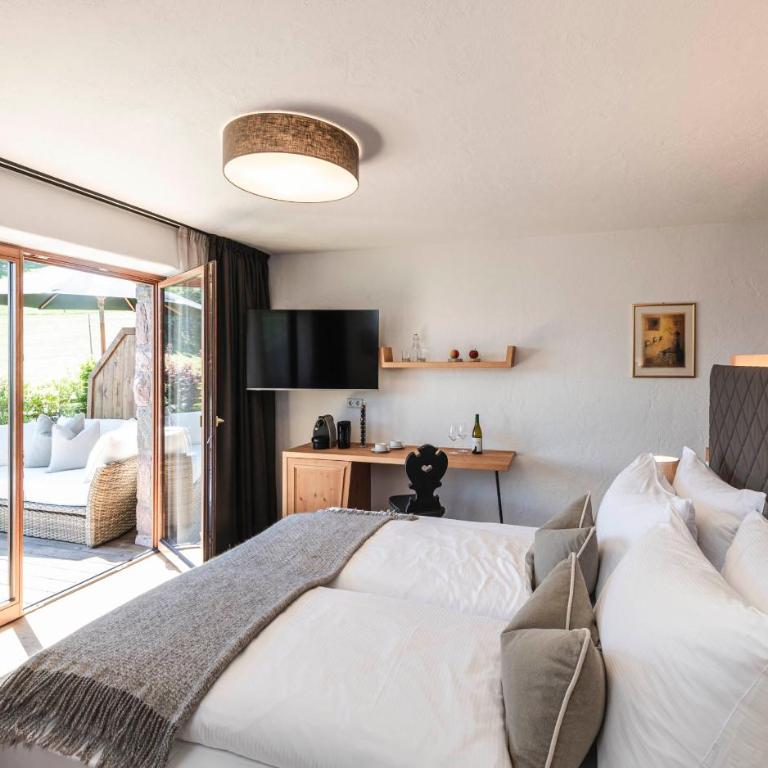 Chalet Grumer Suites&Spa - Suite con Vista Giardino - 1