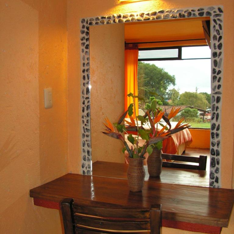 Hotel puesta del sol - Habitación Cuádruple con vistas al lago - 4