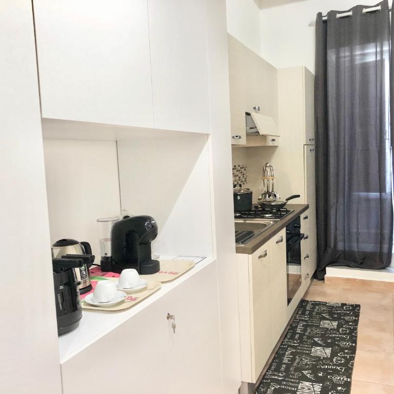 SUITE 4 CANTI - Appartamento con 1 Camera da Letto - 4