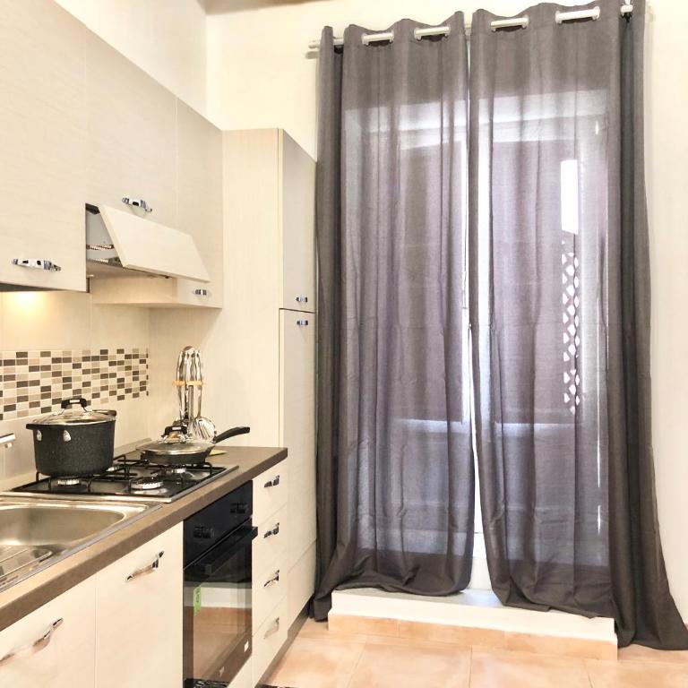 SUITE 4 CANTI - Appartamento con 1 Camera da Letto - 6