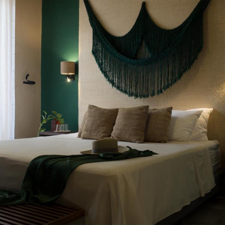 Ya'ax Hotel Boutique - Suite con cama extragrande - 1