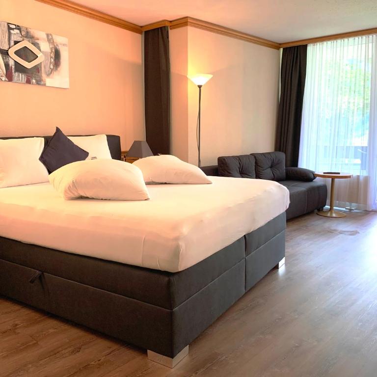 Hotel Quellenhof Leukerbad - Dreibettzimmer - 4