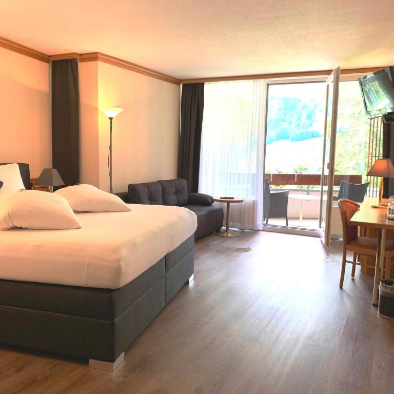 Hotel Quellenhof Leukerbad - Dreibettzimmer - 3