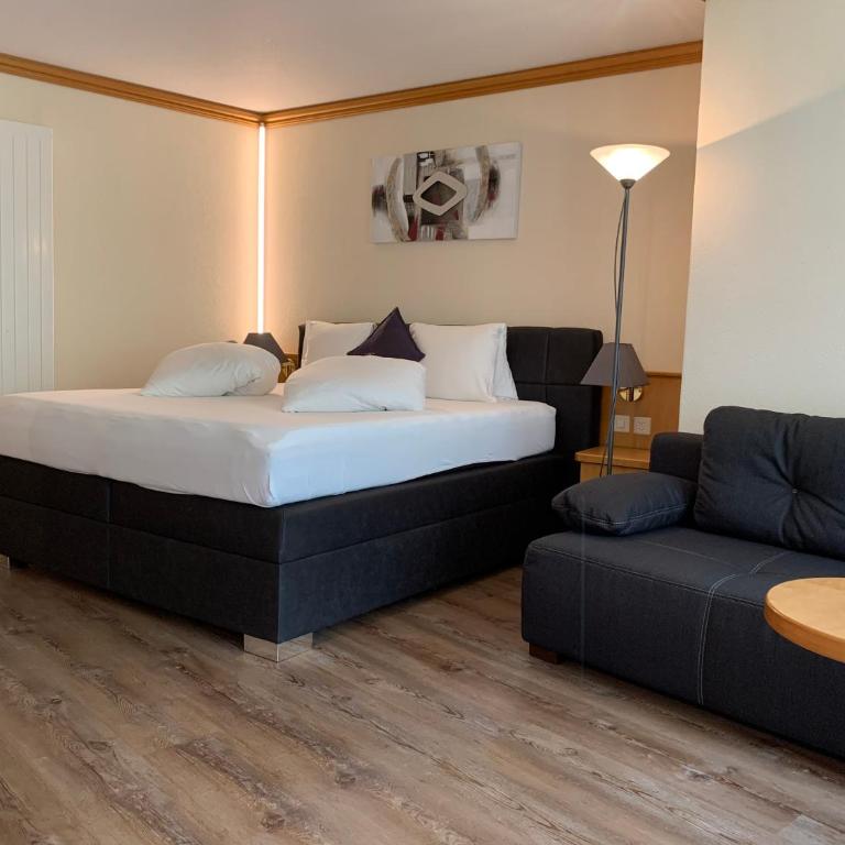 Hotel Quellenhof Leukerbad - Dreibettzimmer - 2