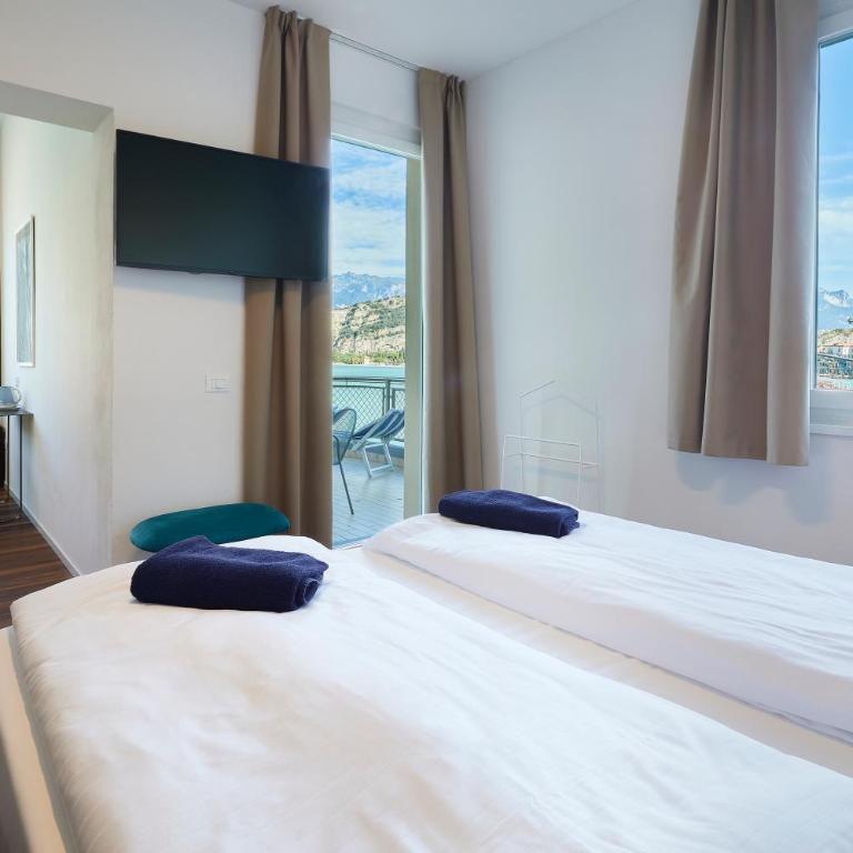 Hotel Paradiso Conca d'Oro - Deluxe Doppel-/Zweibettzimmer mit Seeblick - 8