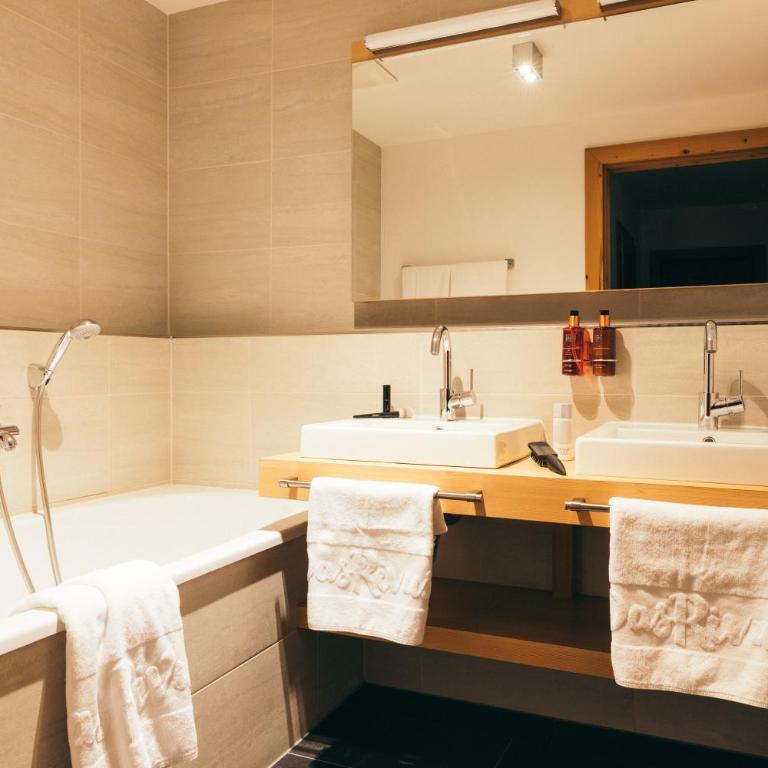 Boutique Hotel Das Rivus - Apartment mit Poolblick - 1