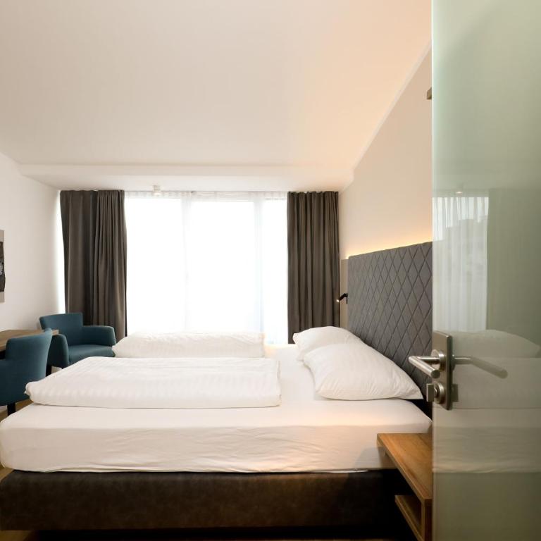 Das Jedermann Boutiquehotel mit Stadtgarten - Doppelzimmer mit Gartenblick - 5