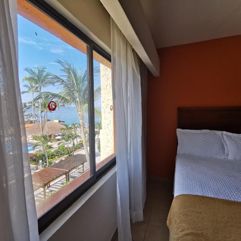 Canto del Sol Puerto Vallarta All Inclusive - Habitación Doble Deluxe con vistas laterales al mar - 1