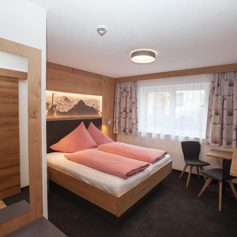 Haus Küchelspitz - Dreibettzimmer - 2