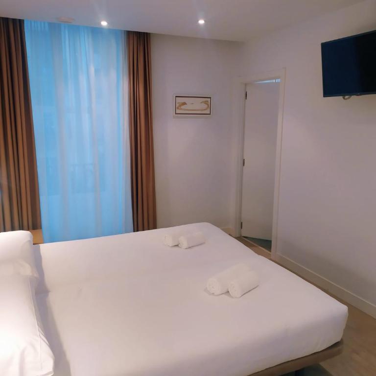 Pensión Sarriegi - Habitación Doble Deluxe con balcón - 1 o 2 camas - 8