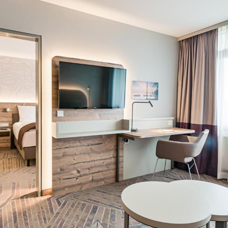 feelMOOR - Gesundresort Bad Wurzach - Suite mit Kingsize-Bett und Balkon - 5