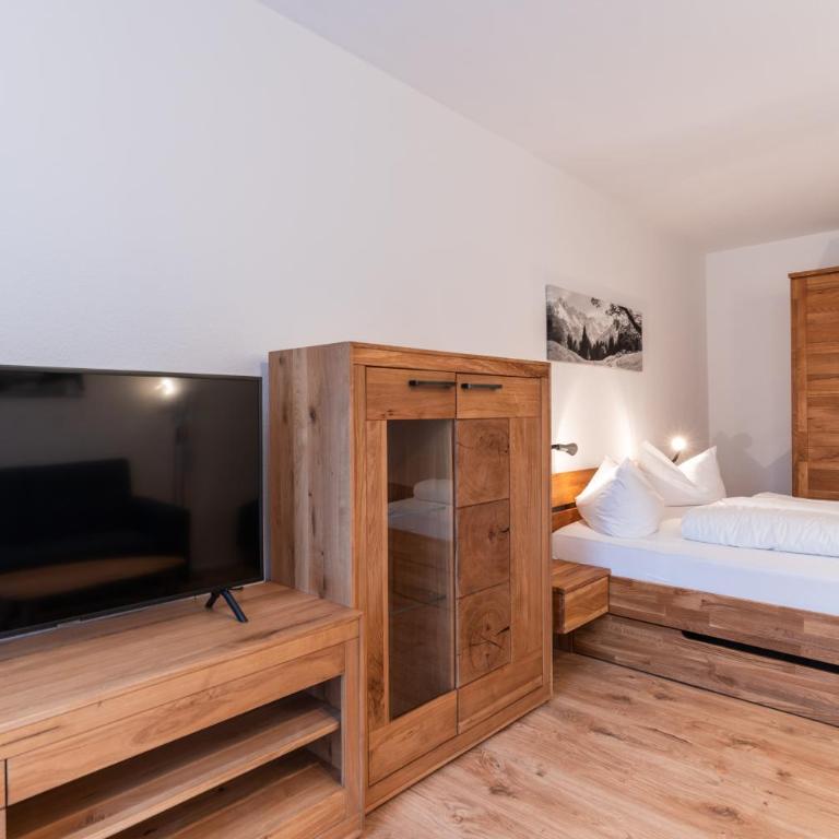 Ferienwohnungen Sattler - Apartment mit Terrasse - 17