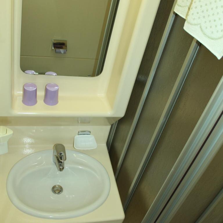 Appartement Pension Grasser - Doppelzimmer mit Balkon - 8