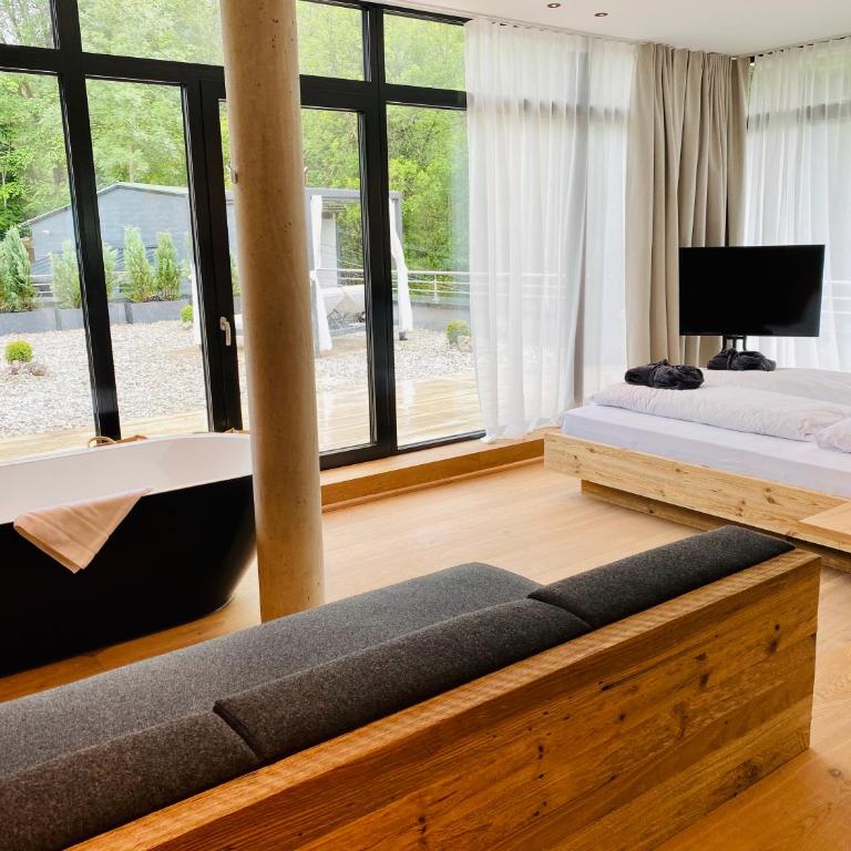 Das Graseck - mountain hideaway & health care - Spa-Eckzimmer mit eigener Sauna und Sonnenterrasse mit Panoramablick - 1