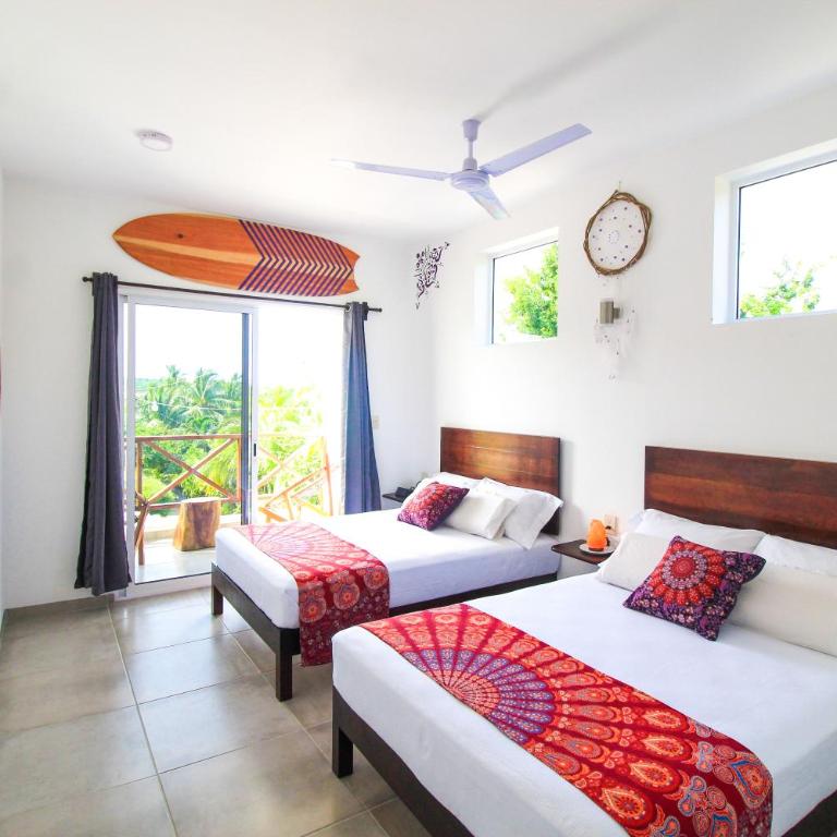 Casa de Olas Boutique Hotel - Habitación Cuádruple con balcón - 4