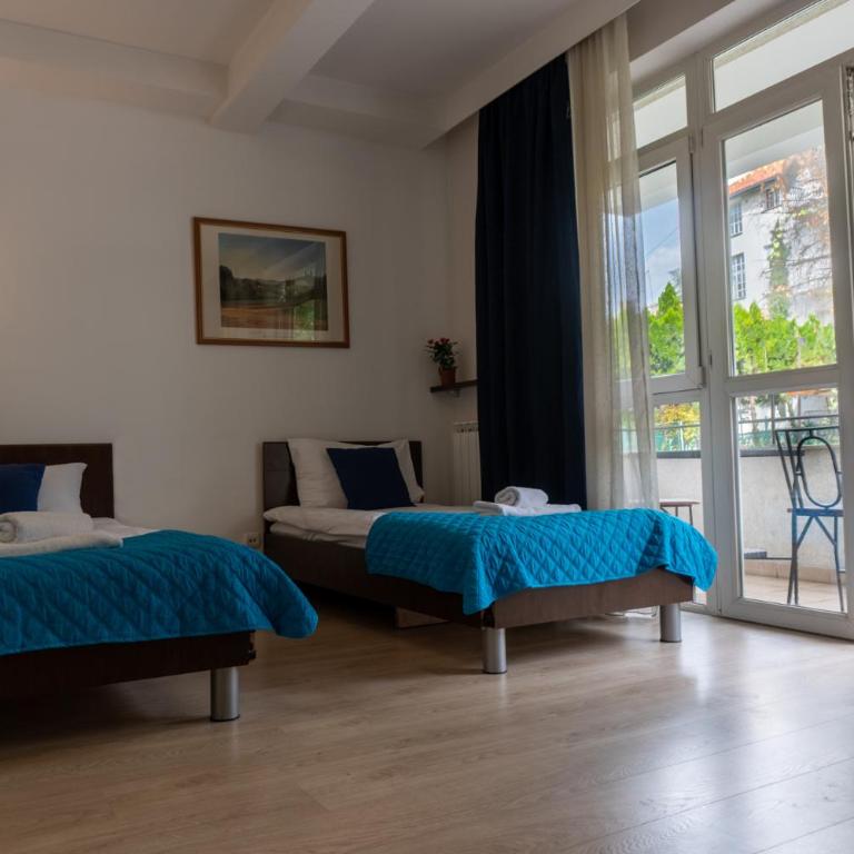 Villa Bulevar - Porodični Apartman sa 2 Spavaće Sobe, Kuhinjom i Terasom - 1