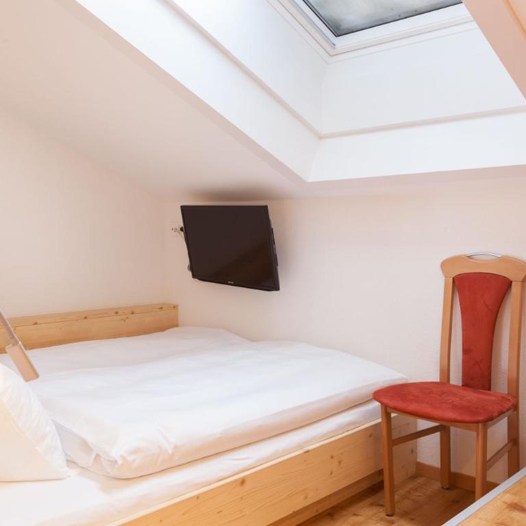Hotel Capricorn - Familiensuite mit Blick auf das Dorf - 3