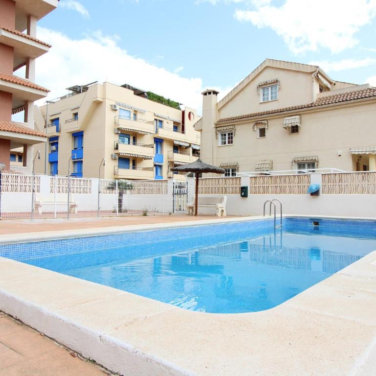 Global Vacacional, Estudio para parejas con piscina en Canet playa - Studio-Apartment - 1