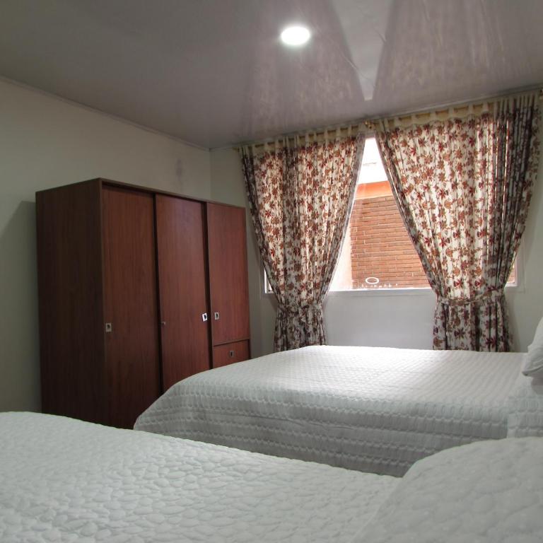 Touristic House - Habitación Doble con baño privado - 1 o 2 camas - 5