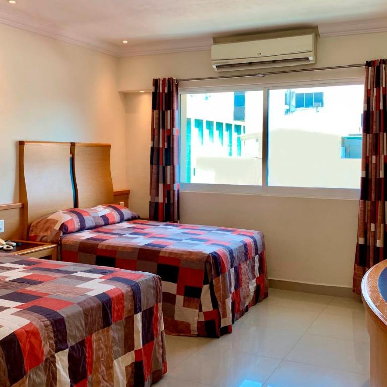 Hotel Nilo - Habitación Doble - 2 camas dobles - 2