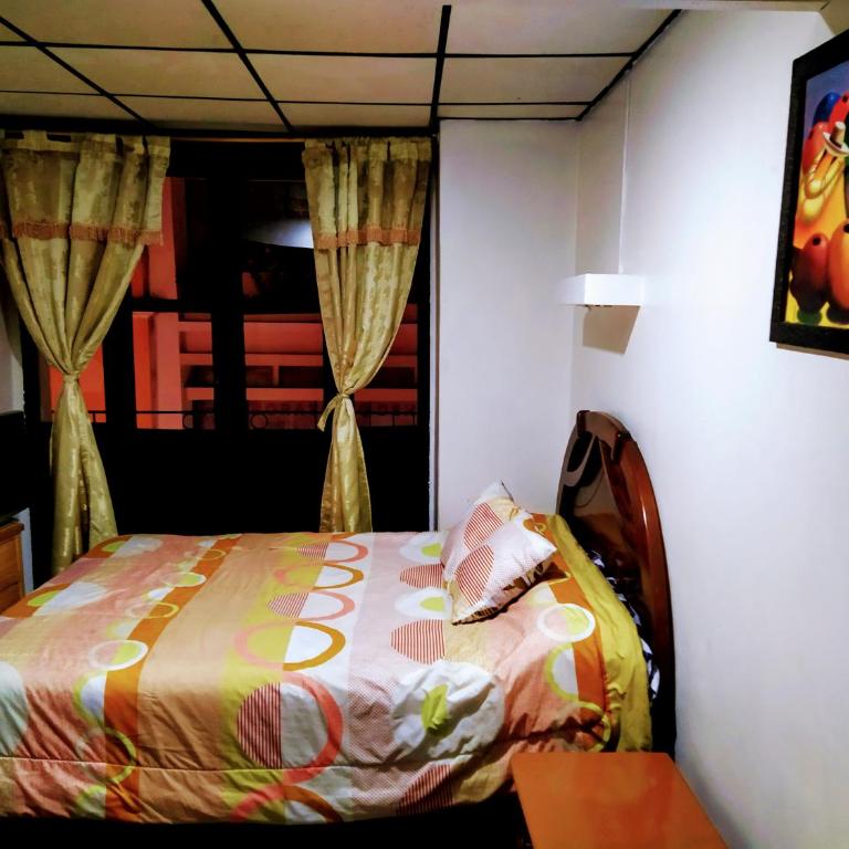 Hostal Latitud Ecuem - Habitación Doble - 2 camas - 3