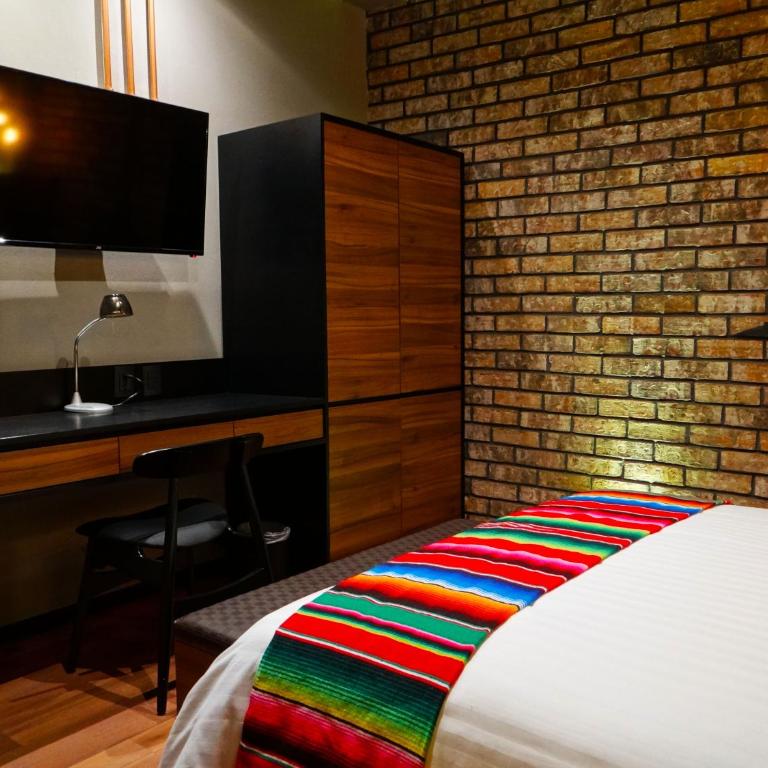Cadillac Hotel Boutique - Habitación con cama grande - 6