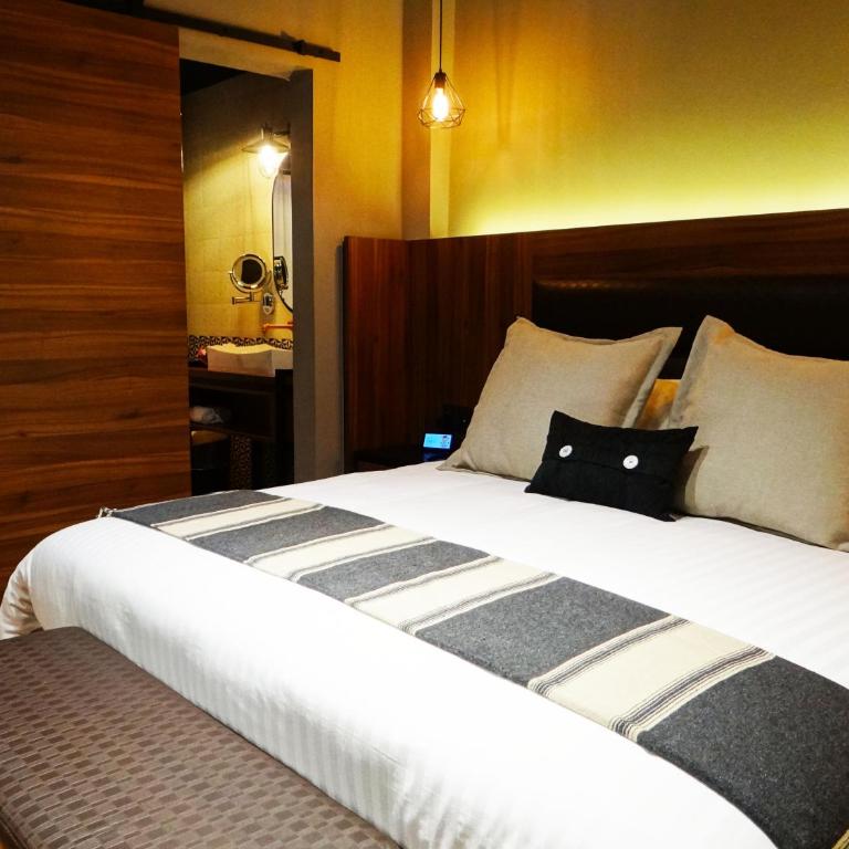Cadillac Hotel Boutique - Suite Deluxe con cama extragrande - 1