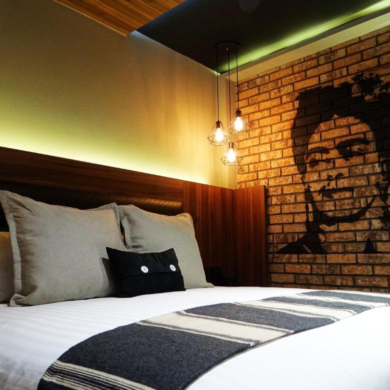 Cadillac Hotel Boutique - Suite Deluxe con cama extragrande - 7