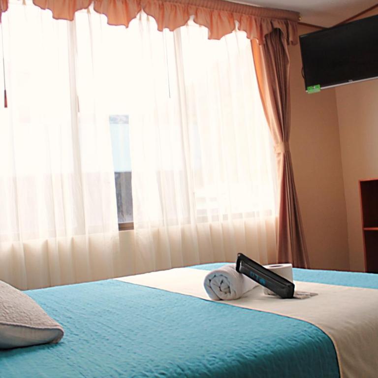 Hostal Dulce Amanecer - Habitación Cuádruple con balcón - 9