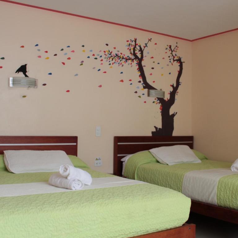 Hostal Dulce Amanecer - Habitación Cuádruple Dúplex - 2